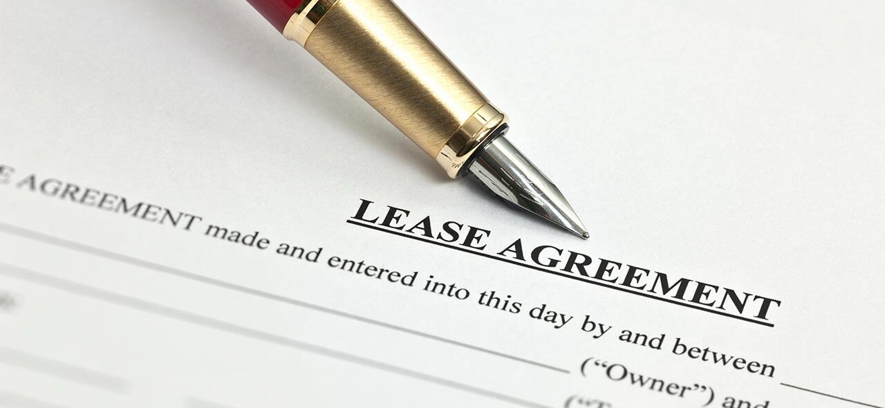 Lease agreement document and pen