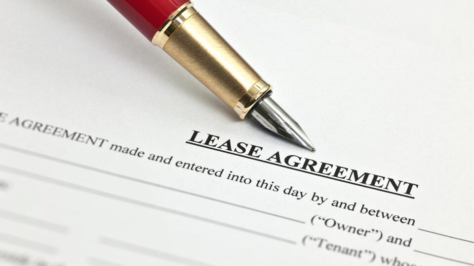 Lease agreement document and pen