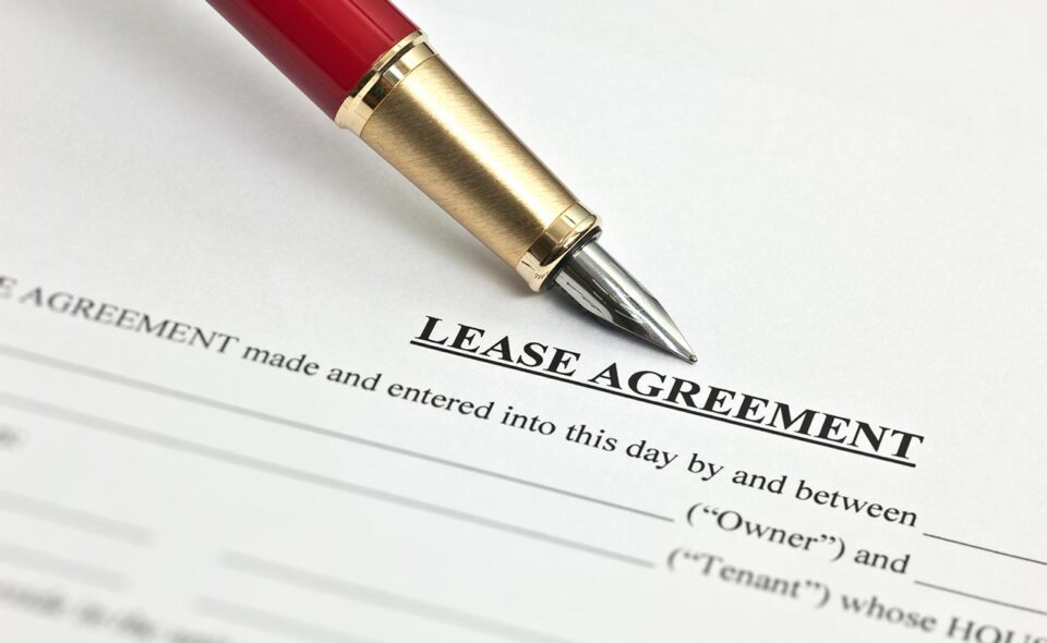 Lease agreement document and pen