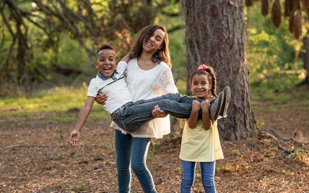 Trio of siblings in the park