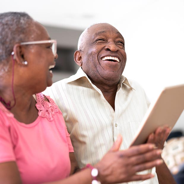 Older couple with tablet