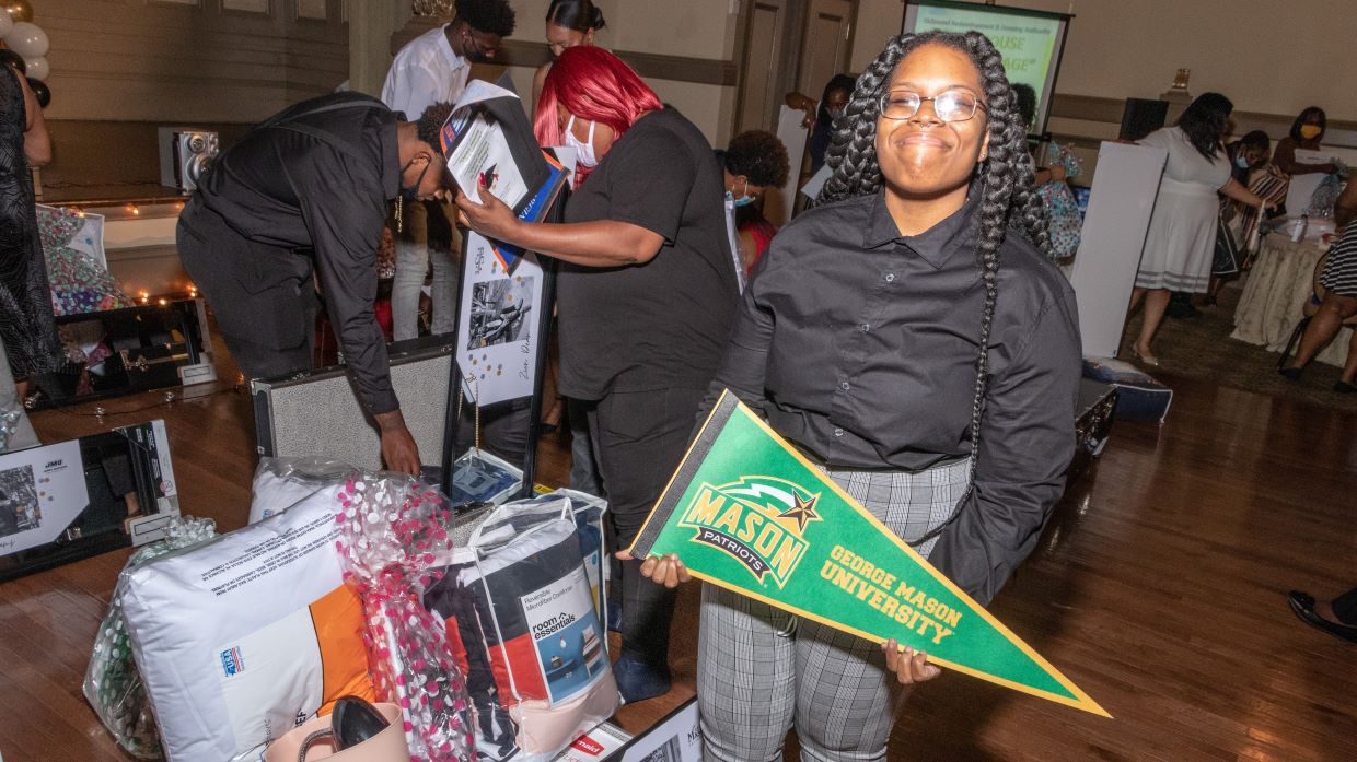 2020 scholarship recipient posing with gift