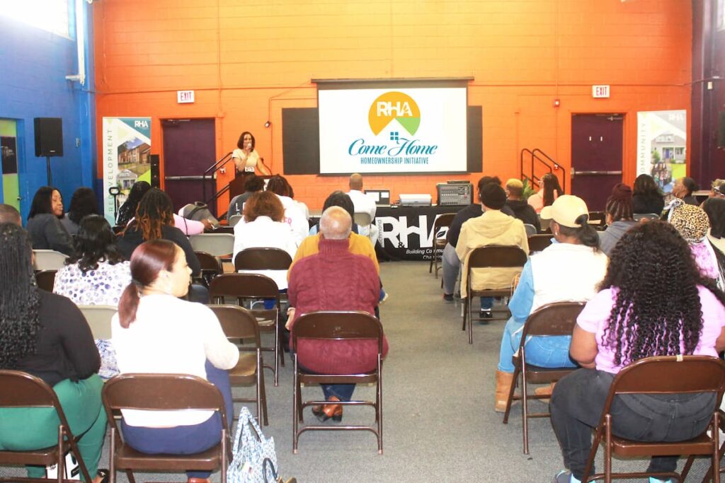 Angela Fountain presenting at a ComeHome town hall