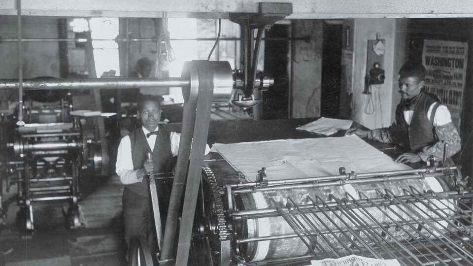 Two black publishers in the press room of the Richmond Planet, 1899