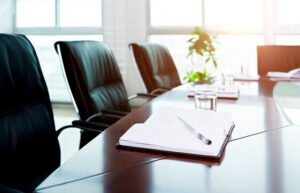 Office chairs around a boardroom table